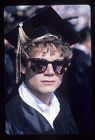 Graduate in sunglasses